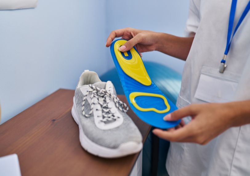 custom orthotics about to be inserted into shoes