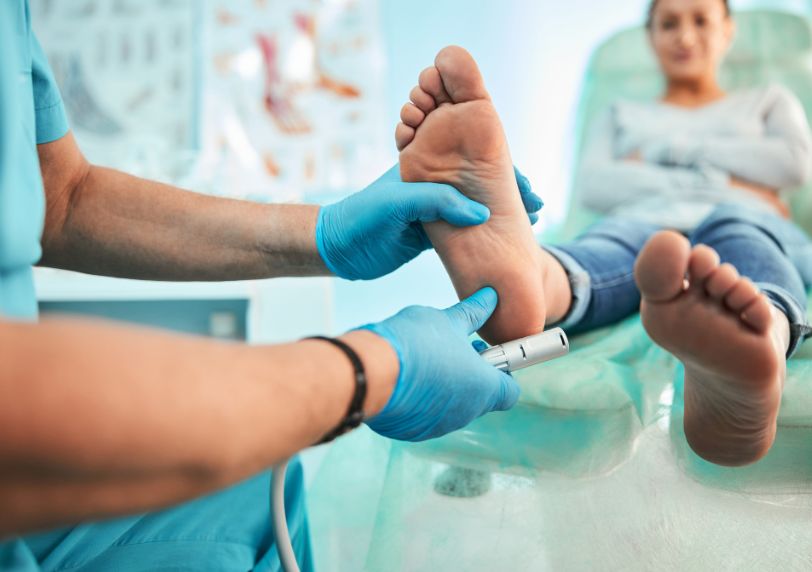 conducting shockwave therapy on a patient